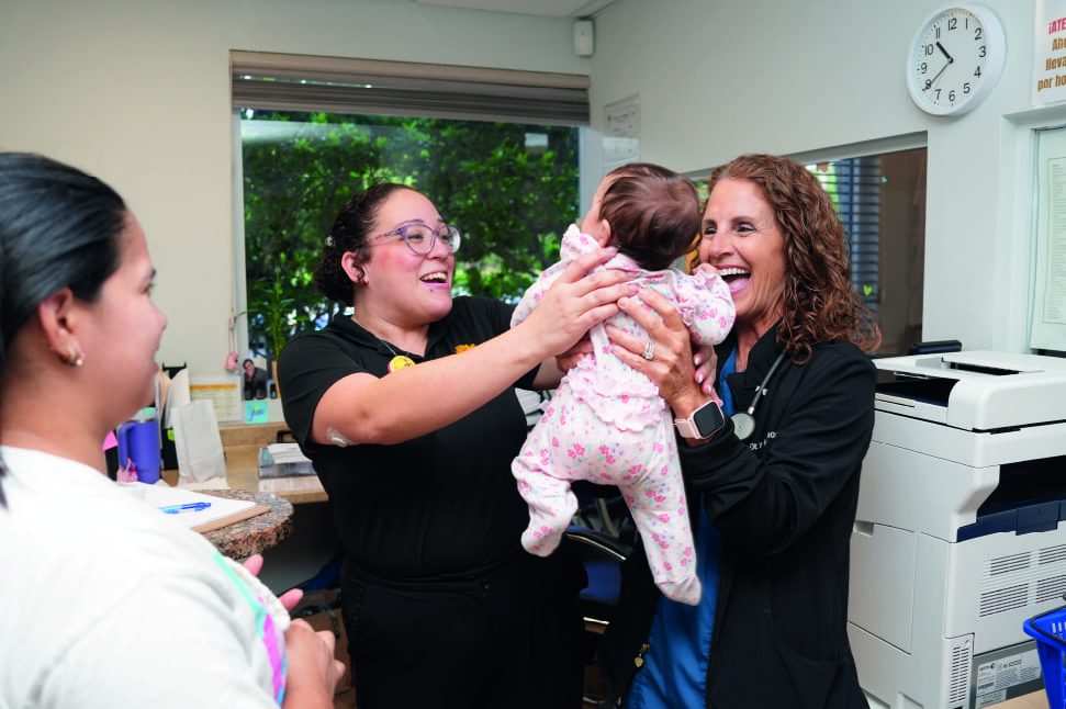 Tree of Life nurses caring for a young child